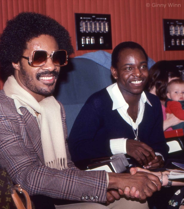 Musician, Singer, Songwriter, and Producer Stevie Wonder, and Singer, Songwriter and Producer Reverend Patrick Henderson in studio circa 1975 in Los Angeles, California.